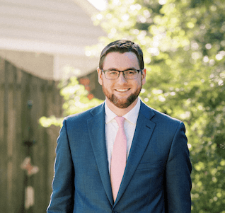 Photo of Adam Couch, Market Analyst