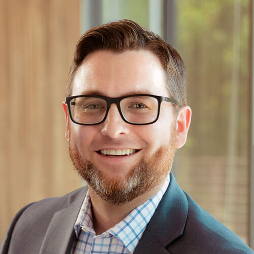 Photo of Adam Couch, Market Analyst