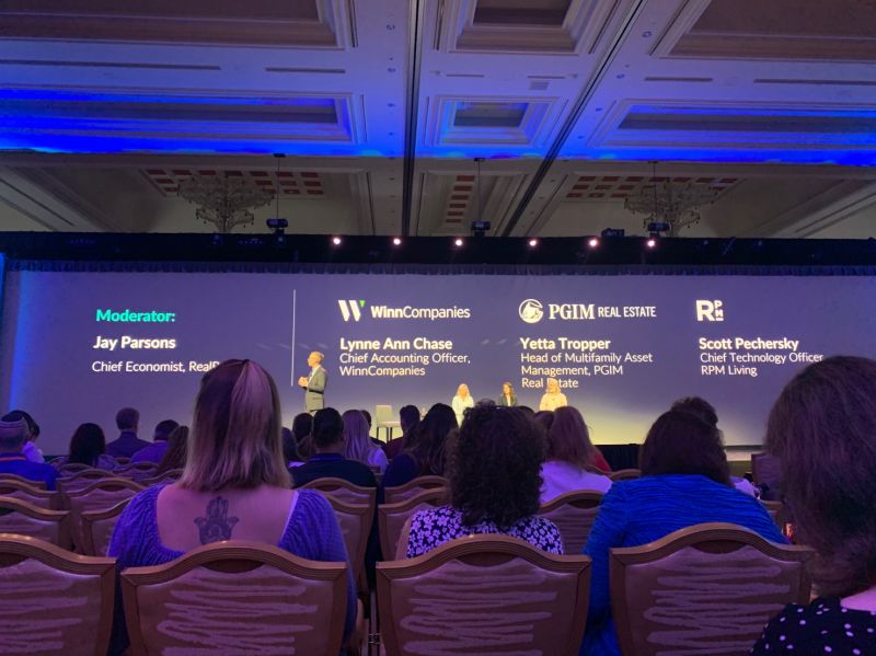 A conference panel featuring four speakers: Jay Parsons, Lynne Ann Chase, Yetta Tropper, and Scott Pechersky.