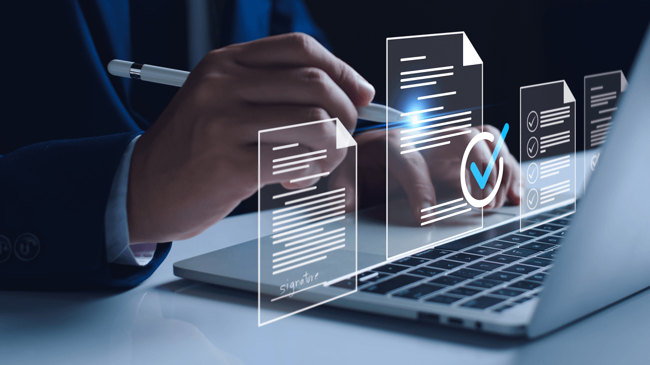 A person reviewing documents on a laptop, with digital overlays showing checked items and signatures.